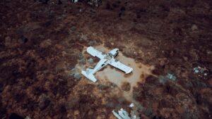 Aerial shot of an abandoned airplane in a rural field in Nicosia, Cyprus.